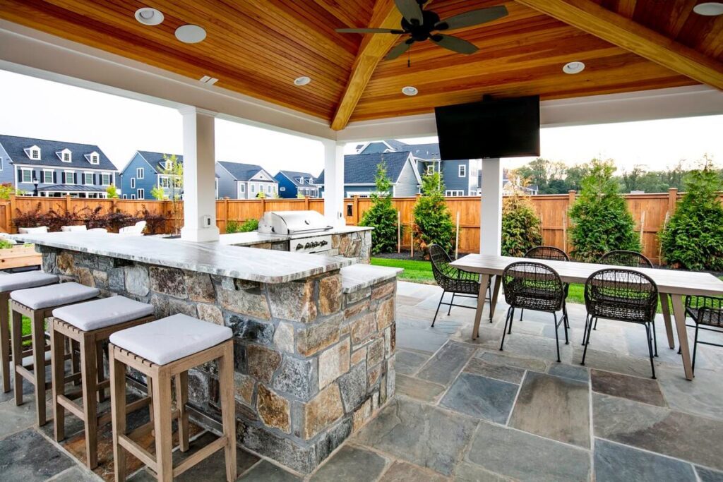 outdoor pool pavilion with bar and kitchen