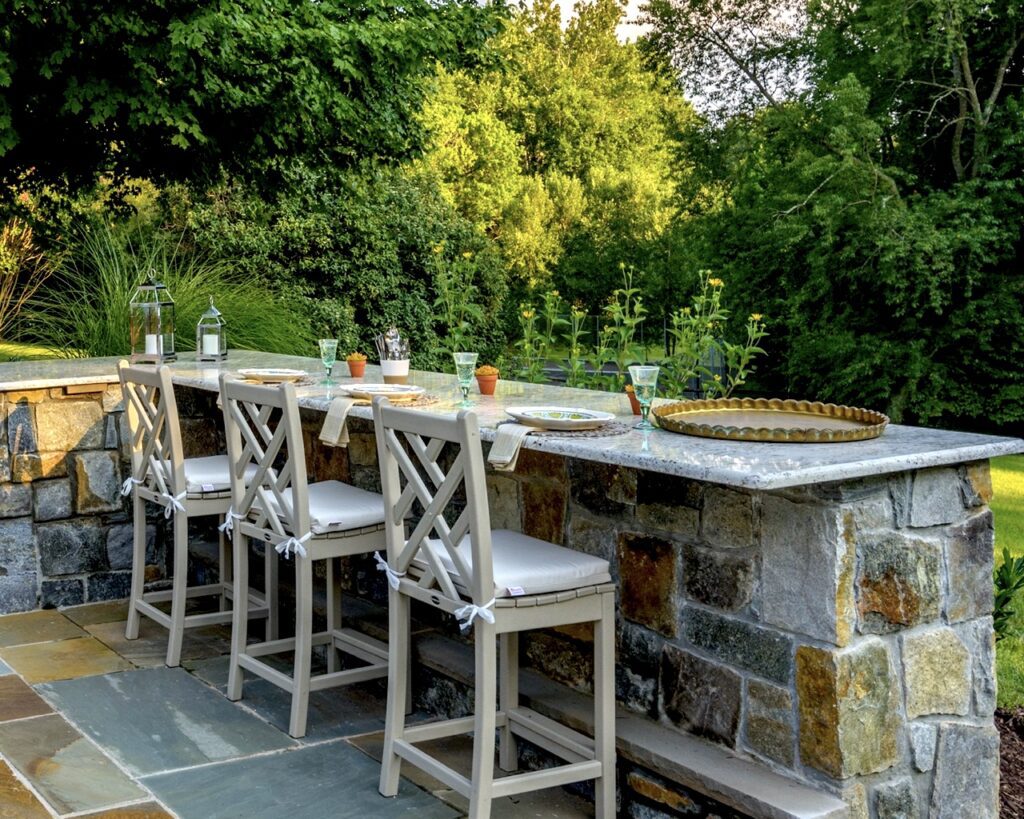 outdoor stone bar seating with granite countertops