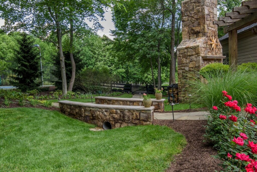 Flagstone Walkway with Stone Bridge Landscape Plantings Stone Fireplace Path Lighting