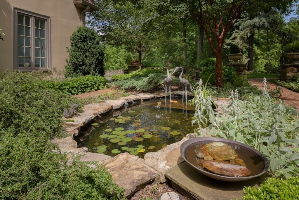 Custom Water Feature with Lush Landscape Plantings