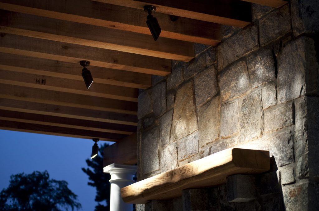 Stone Fireplace with Mantel, Pergola and Accent Lighting