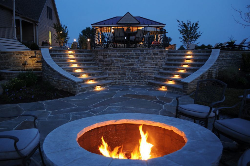 Stone Firepit with Flagstone Patio; Stone Retaining Walls and Flagstone Patio