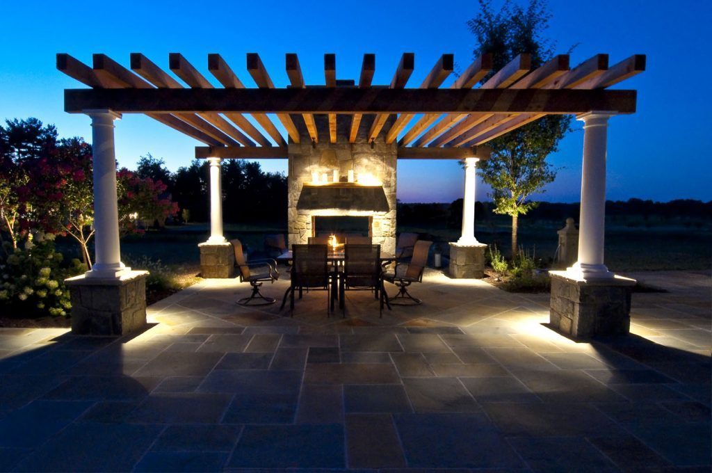 Outdoor Stone Fireplace with Custom Cedar Pergola with Stone Piers Flagstone Patio Low Voltage Lighting