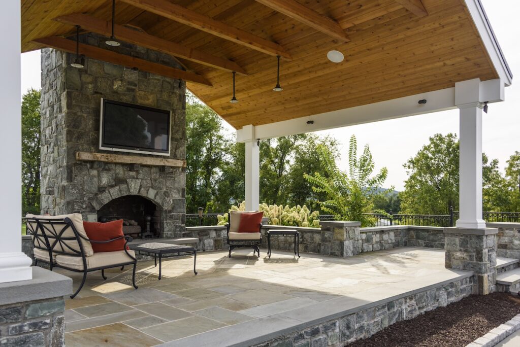 custom pavilion with fireplace and tv