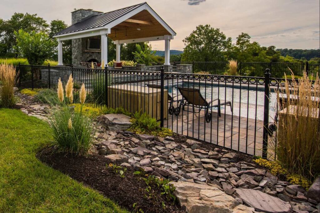 Clearwater Landscape & Nursery Hardscape Flagstone Patio Paver Patio Stone Seat Walls Stone Piers Stone Steps Outdoor Fireplace Custom Pavilion Landscape Plantings Swimming Pool Dry Creek Bed