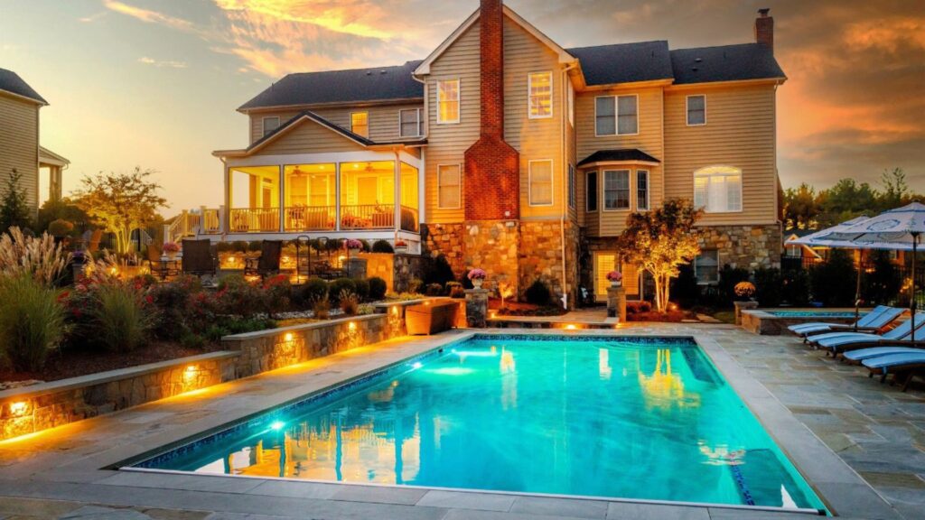 Clearwater Landscape & Nursery Hardscape Swimming Pool & Spa Flagstone Patio Stone Retaining Wall Stone Landscape Plantings Landscape Lighting Screened Porch