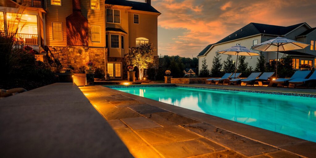 Clearwater Landscape & Nursery Hardscape Swimming Pool & Spa Flagstone Patio Stone Retaining Wall Landscape Plantings Landscape Lighting