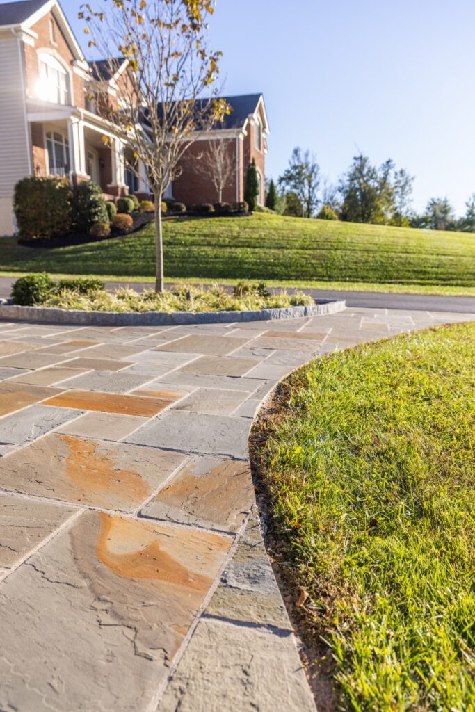 Clearwater Landscape & Nursery Hardscape Flagstone Walkway Landscape Plantings Granite Curb