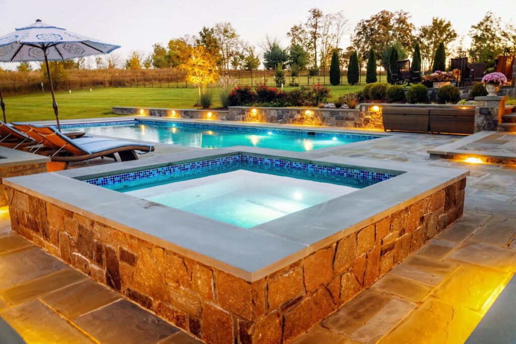 Clearwater Landscape & Nursery Hardscape Swimming Pool & Spa Flagstone Patio Stone Retaining Wall Stone Landscape Plantings Landscape Lighting