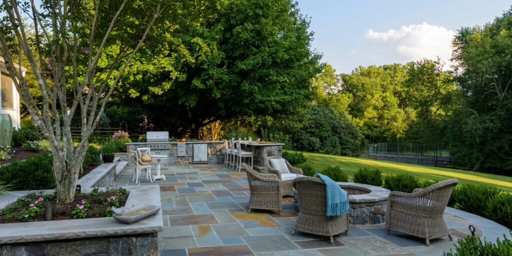 Clearwater Landscape & Nursery Hardscape Flagstone Patio Stone Walls Outdoor Kitchen & Bar Stone Fire Pit Landscape Plantings