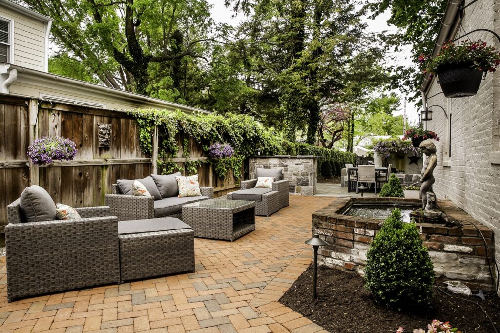 Clay Brick Patio in backyard with custom water feature Bar Seating