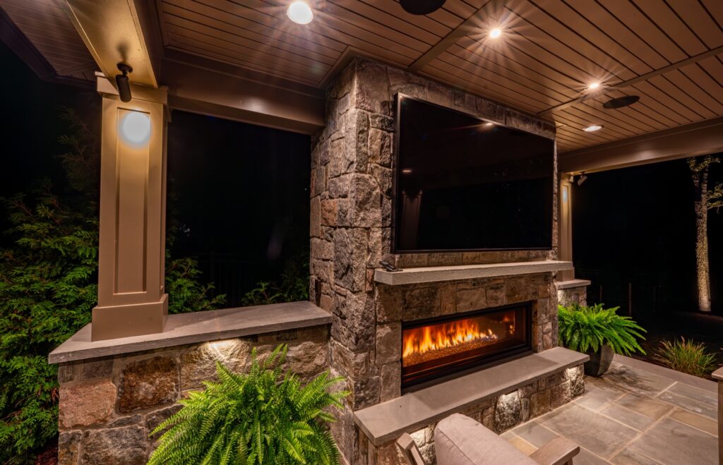 Covered Pavilion with outdoor Stone gas fireplace Stone Mantel with TV