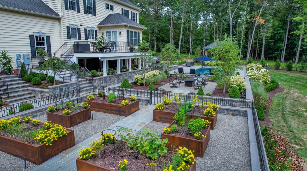 Garden with Raised Corten Steel Planters Stone Walls and Steps