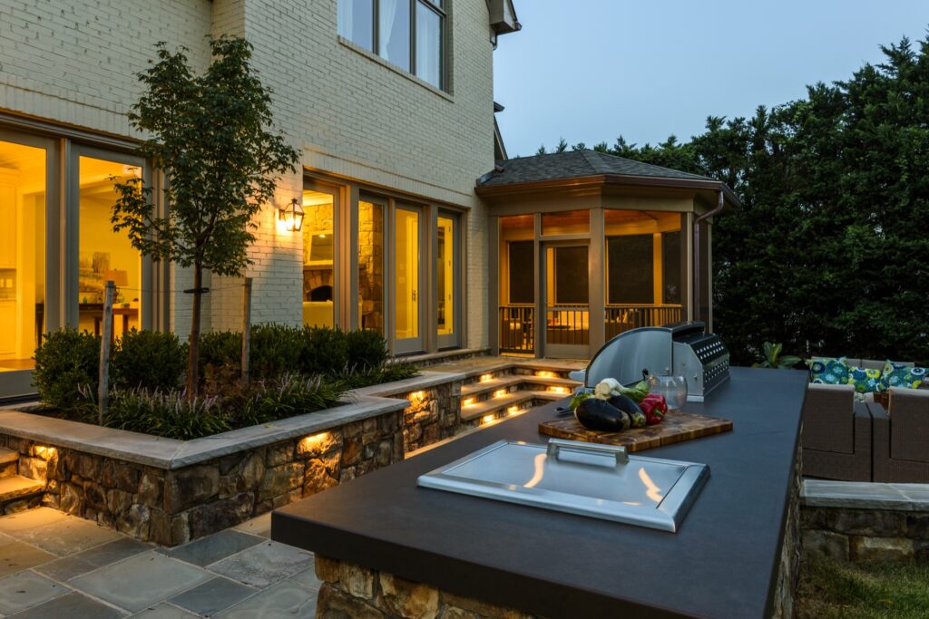 screened porch and bbq kitchen patio with stone steps