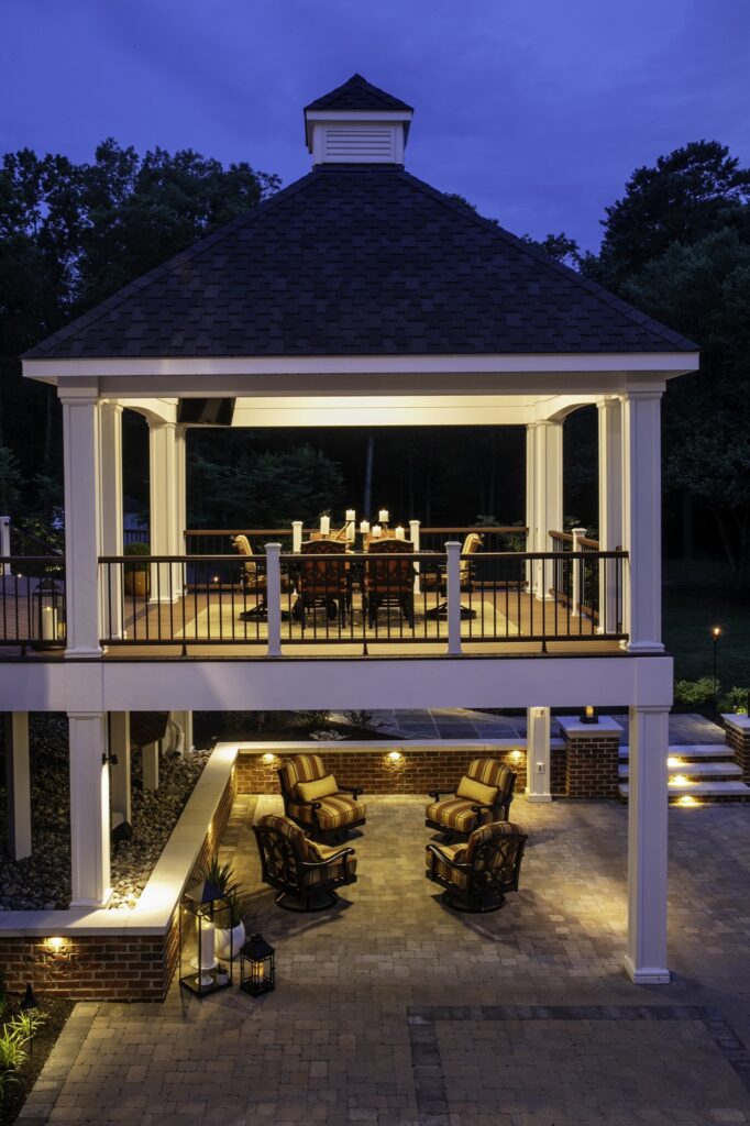 composite deck with dining pavilion and paver patio