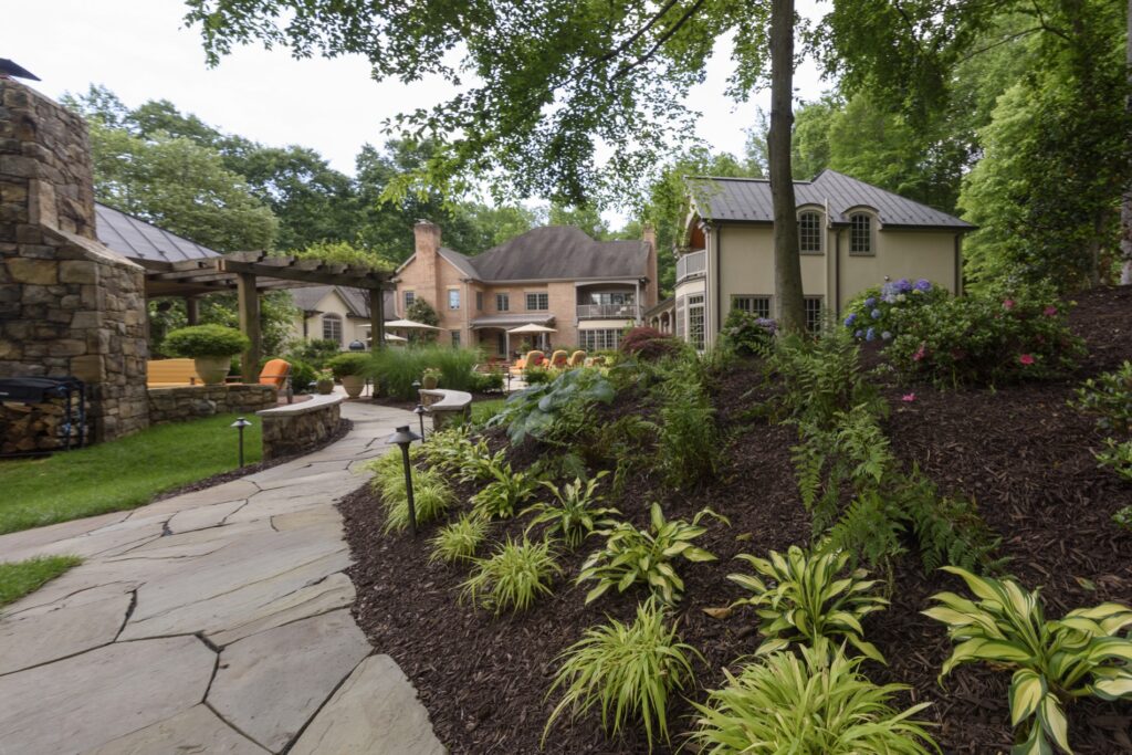 landscape plantings and flagstone garden walkway