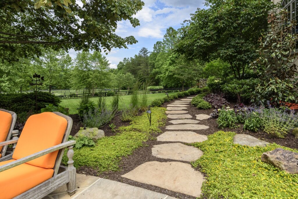 flagstone garden stepper walkway with landscape plantings