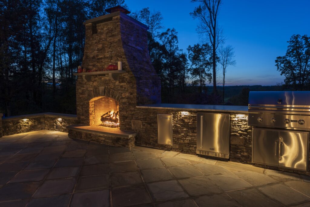 Outdoor Stone Fireplace Outdoor Stone Kitchen with Grill and refrigerator flagstone patio Low Voltage Lighting
