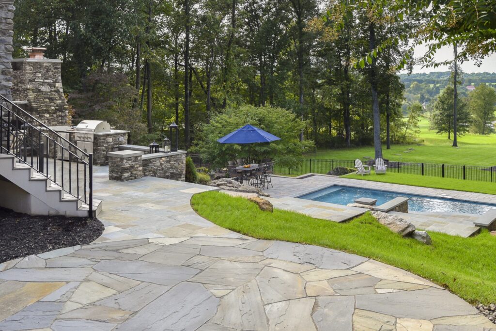 Clearwater Landscape and Nursery woodburning stone fireplace, BBQ and Flagstone Patio