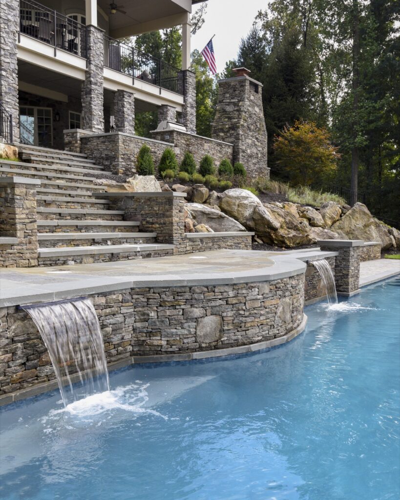 Clearwater Landscape and Nursery elevated flagstone walkway above swimming pool
